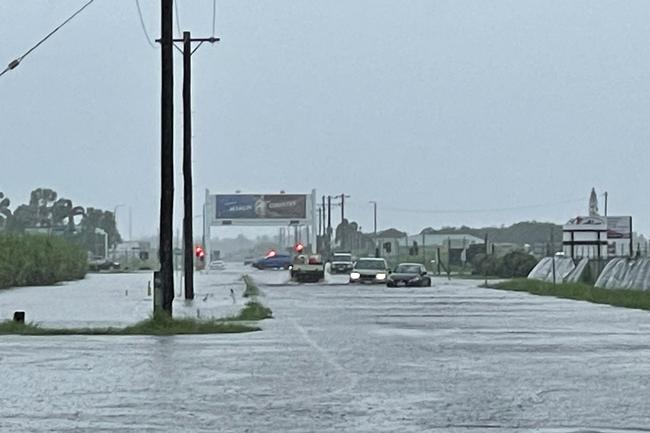 Boundary Rd East, heading into Mackay Airport beginning to flood over as of 8.10am on February 4, 2025. The airport was still open as this photo was taken. Picture: Janessa Ekert