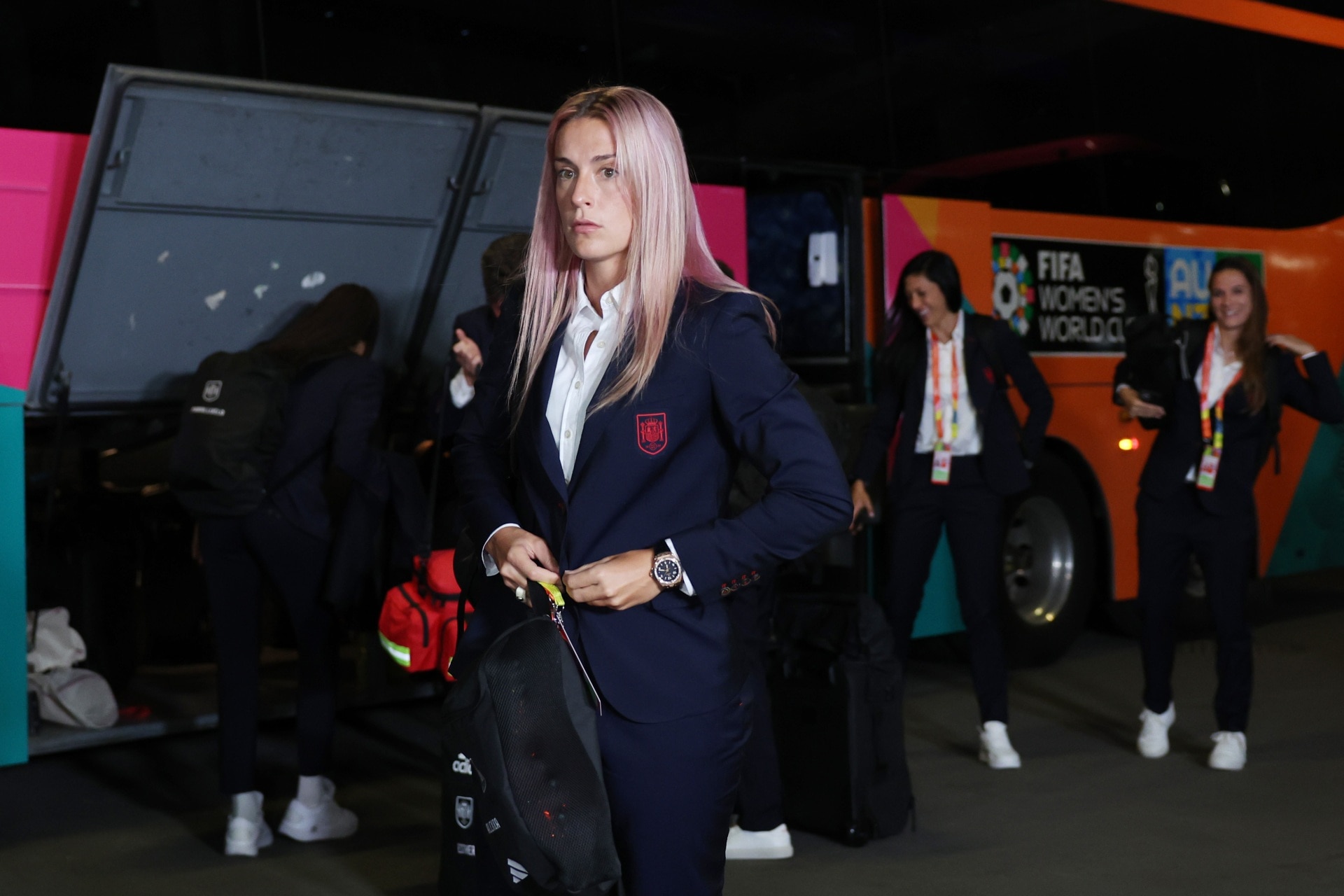 <p><em>Image credit: Getty Images</em></p><h2>Spain </h2><p>Scrapping the bright red uniforms <a href="https://www.vogue.com.au/culture/world-cup/teams-to-watch-womens-world-cup-2023/image-gallery/b015a7c1189acff9d6f86dcb800b15cc" target="_blank" rel="noopener">Spain</a> traditionally play in, off-pitch, the team’s look is more neutral and pared-back. In a dark navy suit matched with a white shirt, the subtle team logo is embroidered on the chest. Without straying overly formal, the comfortable look swaps out more formal shoes for a clean pair of white sneakers.</p><p><a href="https://www.newsletters.news.com.au/vogue" data-ml-dynamic="true" data-ml-dynamic-type="sl" data-orig-url="https://www.newsletters.news.com.au/vogue" data-ml-id="1" data-ml="true" data-xid="fr1690257958225ffh" data-skimlinks-tracking="xid:fr1690257958225ffh"><i>Sign up to the Vogue newsletter</i></a></p>