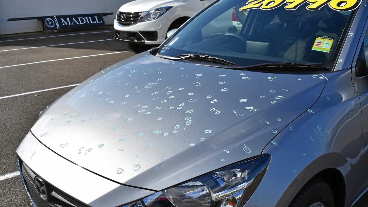 One of the cars severely damaged by a hail storm on Thursday October 12, 2018 at Madill's Mazda dealership on the Bruce Highway in Gympie. Picture: DONNA JONES