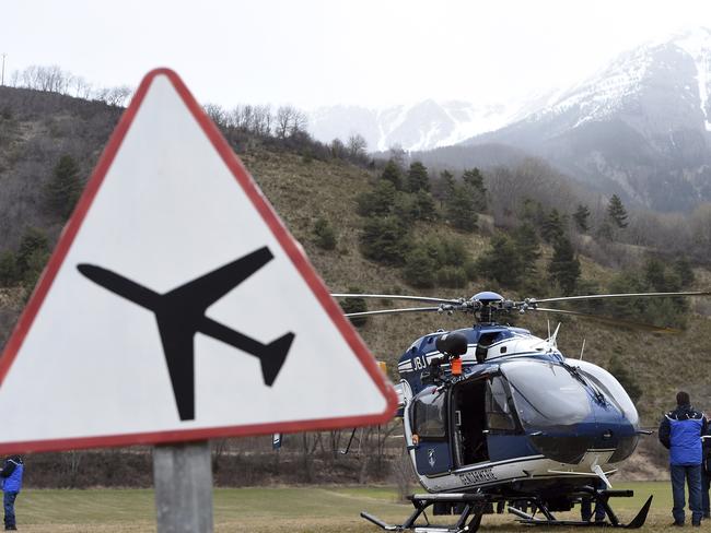 Rescuers leave from a field where the rescue effort is headquartered Pic: Anne-Christine Poujoulat