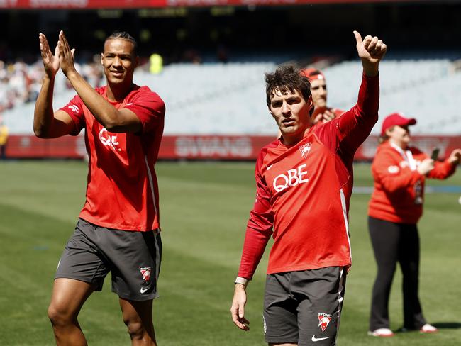 Joel Amartey and Errol Gulden thank fans at the Sydney captain’s run on the MCG. Picture: Phil Hillyard