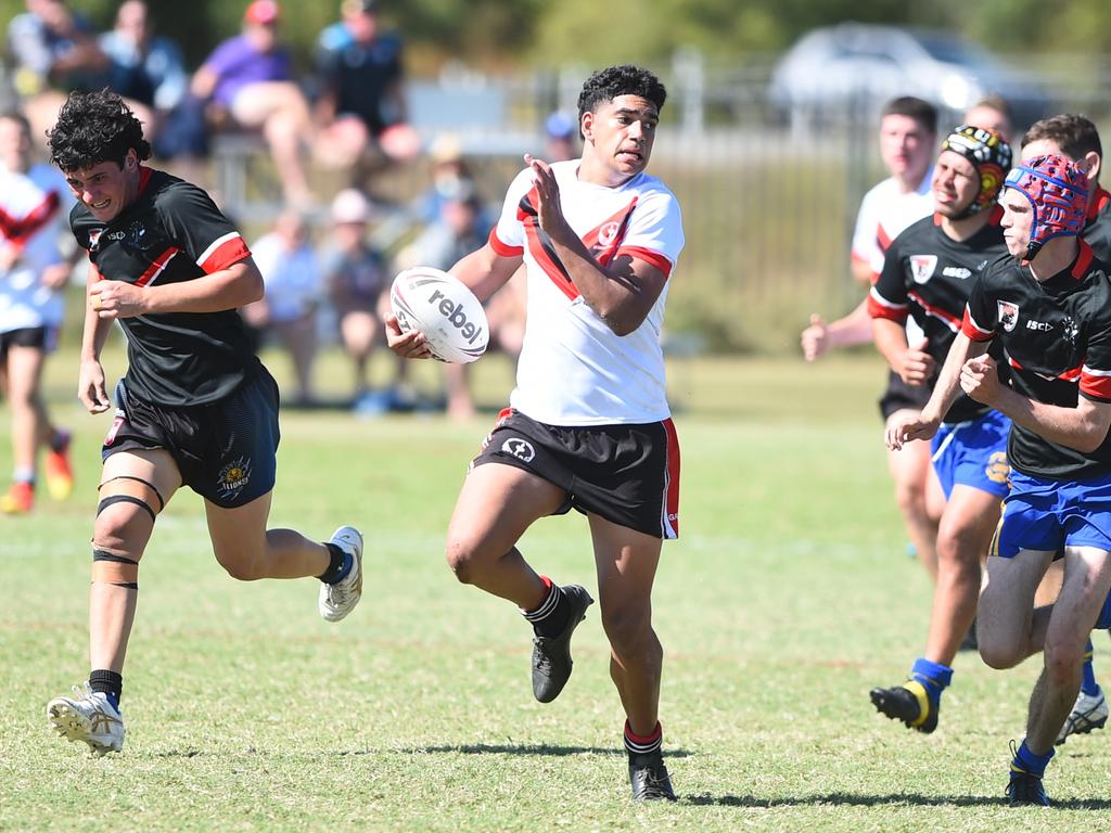 Boys Rugby League State Championship held at Northern Division, Brothers Leagues ground, Townsville. South West (black) v Wide Bay (white). 16-18 years. Noah Law of Shalom College.