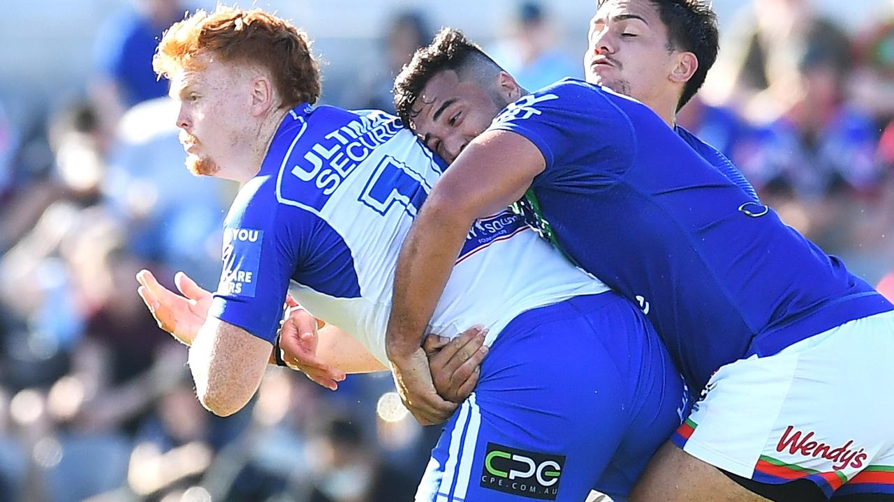 Corey Horsburgh of the Bulldogs is tackled.