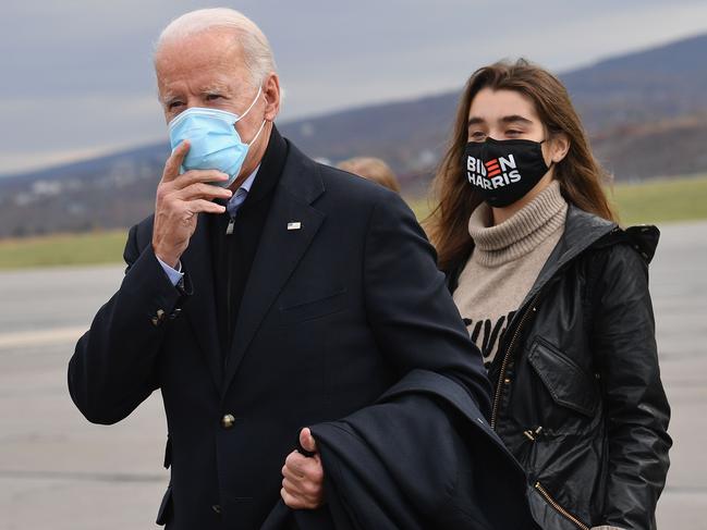 Democratic presidential candidate Joe Biden arrives with his granddaughter Finnegan Biden in Scranton, Pennsylvania on Election Day. Picture: AFP