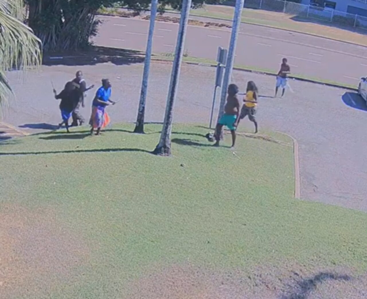 CCTV footage captured a brawl between about 16 people which broke out in the car park of the NT News office on McMinn St, Darwin on June 6, 2024.