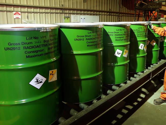 Adrian Boulton checks the packaged barrels of Uranium at BHP Billiton's Olympic Dam project in South Australia. The mine produces Copper, Gold, Silver & Uranium.