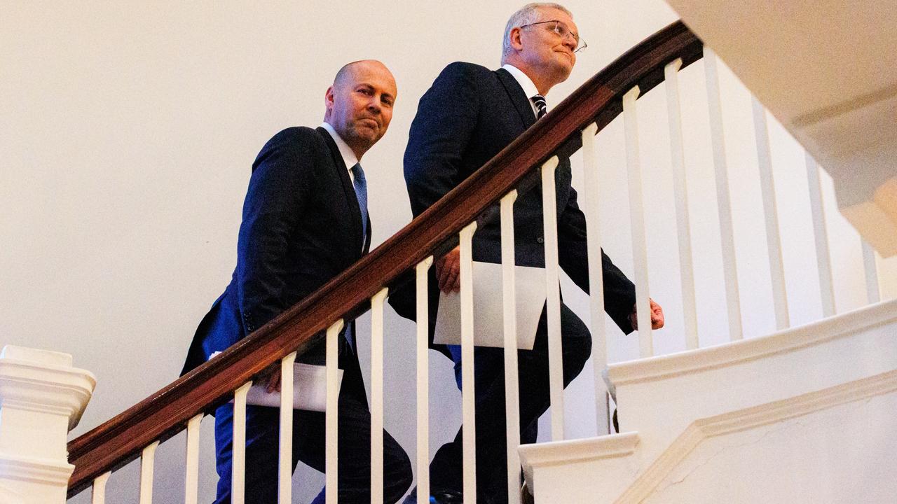 Up they go: Prime Minister Scott Morrison with Treasurer Josh Frydenberg. Picture: Jason Edwards