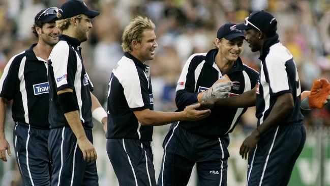 Shane Warne is congratulated by his teammates in his final ODI match at the MCG in 2005 (see question 3)