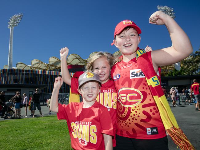 Ace (5) and Aria Franklin (7) with Kaan Kirikci (9) before the Gold Coast Swans take on the Sydney Swans at People First Stadium, Carrara. Picture: Glen Campbell