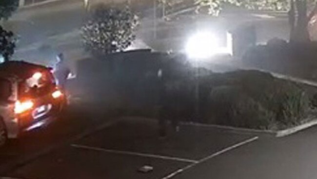 CCTV shows a man running towards the Lexus, as a teen gets out and runs from the car. Picture: Supplied