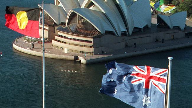 The Aboriginal &amp; Australian flags flying over the Sydney Harbour Bridge. Picture: Warren Clarke