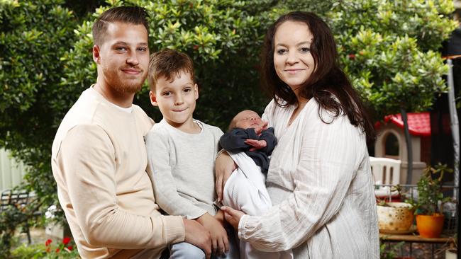 Western Sydneysiders Paul and Jess Peereboom have four kids, including sons Arlo, 6 and 2 week old Micah. Picture: Richard Dobson