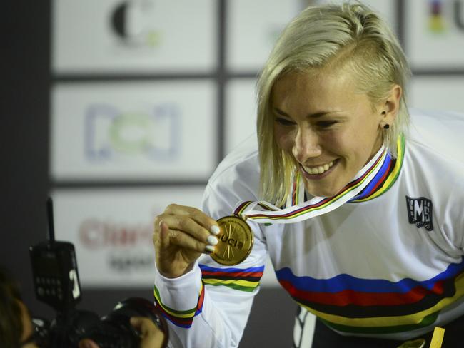 Caroline Buchanan of Australia celebrates after winning a gold medal in the Elite Womens Time Trial Race during of the UCI BMX World Championships on May 28, 2016 in Medellin, Antioquia department, Colombia. / AFP PHOTO / RAUL ARBOLEDA