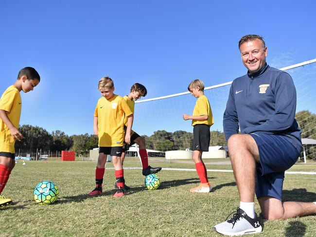 Sunshine Coast Fire sporting director Melvyn Wilkes with junior players. Picture: Patrick Woods