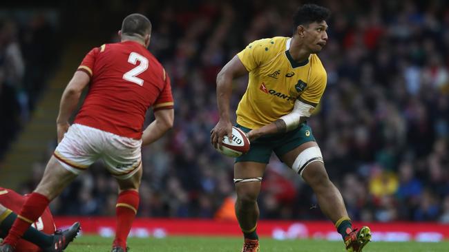 Lopeti Timani looks to pass during last weekend’s big win over Wales in Cardiff. Picture: Getty Images