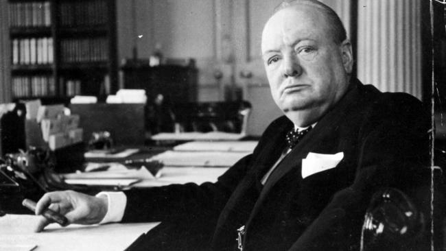 Dec. 1940. British Prime Minister politician Sir Winston Churchill in Cabinet Room at No. 10 Downing Street. Portrait by Cecil Beaton : FILE PHOTO