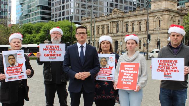 SDA state secretary Josh Peak, with retail, fast food and hospitality workers, urging the-then Marshall Liberal government to make Christmas Day a public holiday. Picture: Milly Schultz-Boylen