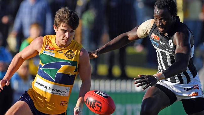 The Eagles’ best player, Jake Johansen gets to the ball ahead of Port Adelaide’s Emmanuel Irra. Picture: Tom Huntley