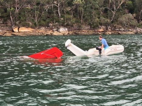 Attempted rescue of the Sydney Seaplanes flight that crashed in the Hawkesbury river on New years eve. Picture by Todd Sellars