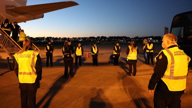 Australian Border Force line the tarmac to escort unlawful citizens back to New Zealand. Picture: ABF