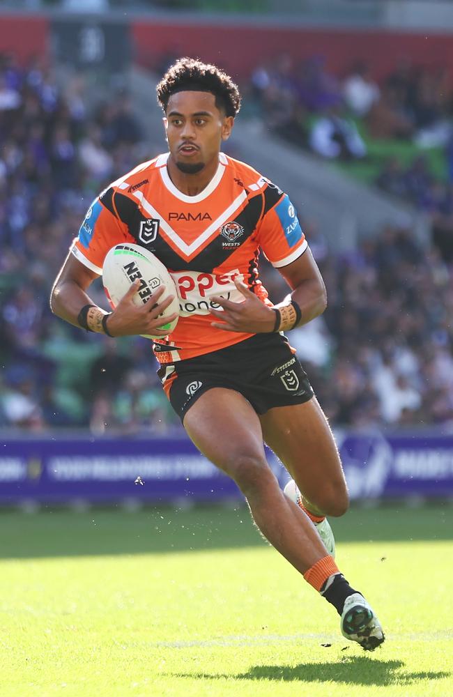 Jahream Bula of the Tigers runs with the ball during the round 10 NRL match between Melbourne Storm and Wests Tigers at AAMI Park, on May 11, 2025, in Melbourne, Australia. (Photo by Mike Owen/Getty Images)