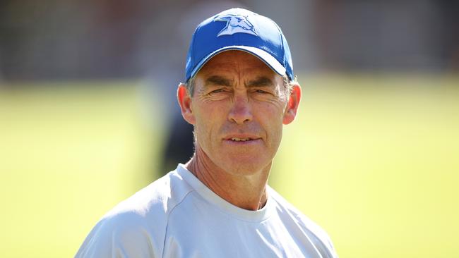 MELBOURNE, AUSTRALIA - MARCH 21: Alastair Clarkson, Senior Coach of the Kangaroos speaks to fans during a North Melbourne Kangaroos AFL training session at Arden Street Ground on March 21, 2024 in Melbourne, Australia. (Photo by Daniel Pockett/Getty Images)