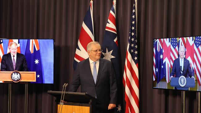 Australian Prime Minister Scott Morrison spoke with the President of the United States Joe Biden and the Prime Minister of the United Kingdom Boris Johnson when they announced the creation of an enhanced trilateral security partnership called AUKUS alliance the United Kingdom, and the United States, via video conference, in Parliament House Canberra. Picture: Newswire/Gary Ramage