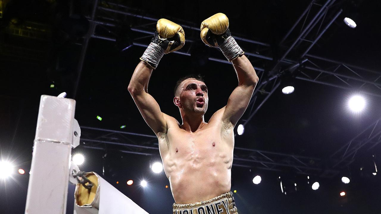 MELBOURNE, AUSTRALIA - OCTOBER 16: Jason Moloney celebrates victory over Nawaphon Kaikanha in the undercard fight before the World Lightweight Championship bout between George Kambosos Jr. of Australia and Devin Haney of the United States at Rod Laver Arena on October 16, 2022 in Melbourne, Australia. (Photo by Kelly Defina/Getty Images)