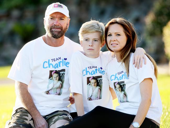 Brett and Melissa Carr, with son Tom, from Dudley, in their Team Charlie shirts. Picture: Peter Clark