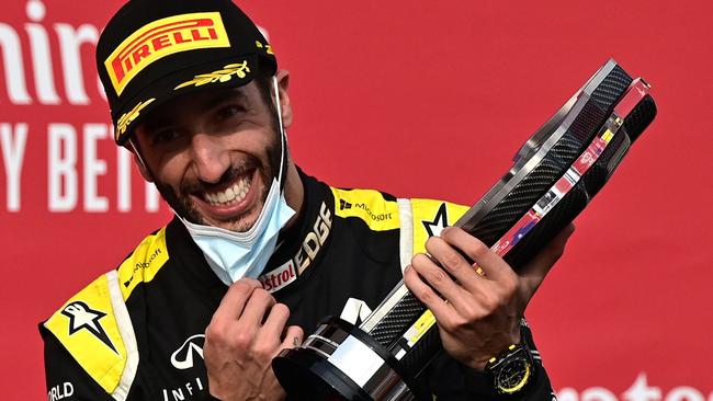 Daniel Ricciardo celebrates his podium finish in Italy.