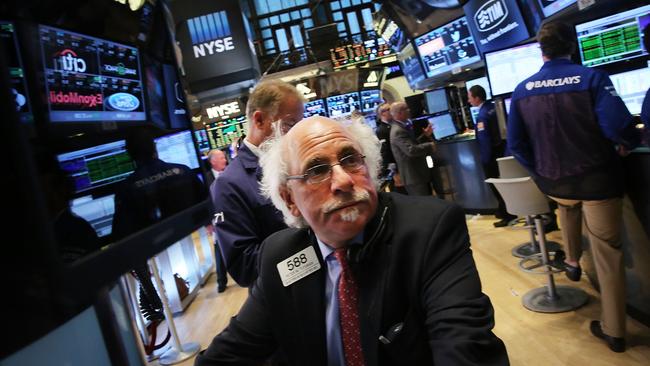 NEW YORK, NY - SEPTEMBER 15: A trader work on the floor of the New York Stock Exchange on September 15, 2015 in New York City. Stocks ended up today with the Dow Jones industrial average finishing the day up over 200 points. Spencer Platt/Getty Images/AFP == FOR NEWSPAPERS, INTERNET, TELCOS & TELEVISION USE ONLY ==