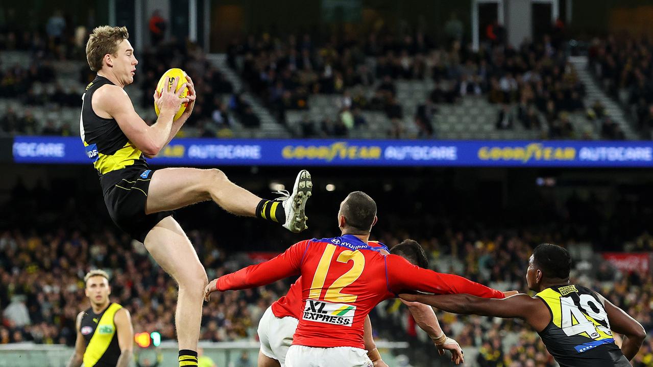 Tom Lynch takes a big mark against Brisbane at the MCG. Picture: Mark Stewart