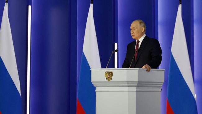 Russian President Vladimir Putin delivers his annual state of the nation address at the Gostiny Dvor conference centre in central Moscow on February 21, 2023. (Photo by Dmitry ASTAKHOV / SPUTNIK / AFP)