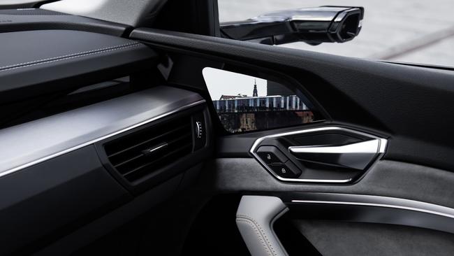 Audi’s e-tron combines high-definition cameras with digital screens mounted near its doorhandles.