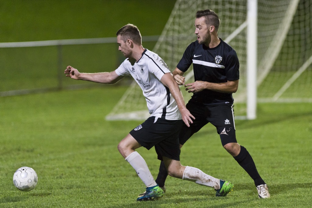 Brayden Thrupp (left) for Willowburn against Brock Tuesley of Willowburn White in Toowoomba Football League Premier Men round five at Commonwealth Oval, Saturday, March 30, 2019. Picture: Kevin Farmer