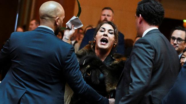 Senator Lidia Thorpe stages a protest as Britain's King Charles and Queen Camilla attend a parliamentary reception in Canberra on Monday. Picture: Reuters