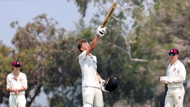 Lachie Russell raises the bat to the sky for Troy Selwood after his century. Picture: Michael Nelson/Geelong Grammar