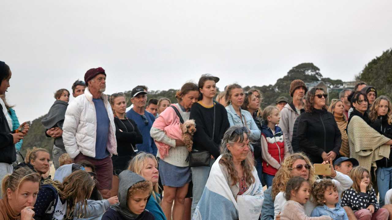 COMMUNITY GATHERS FOR THEO: Over 200 people light a candle for missing backpacker Theo Hayez. Picture: Amber Gibson