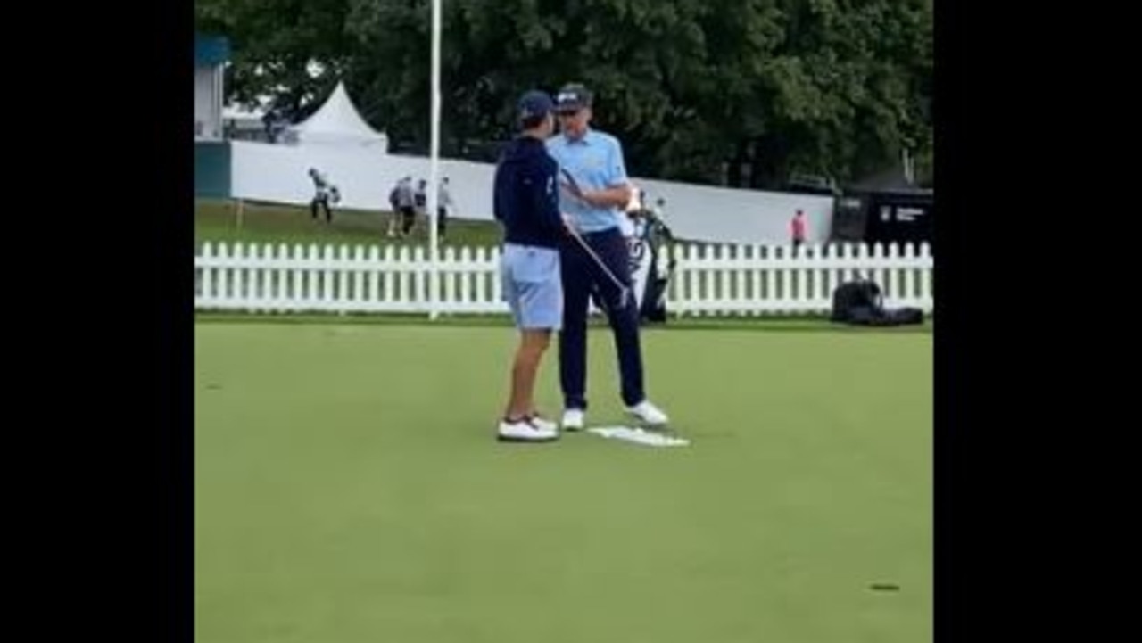 Billy Horschel and Ian Poulter have a chat.