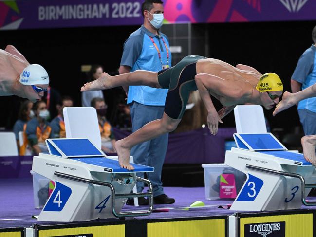 Elijah Winnington takes off in the 200m freestyle. Picture: Andy Buchanan / AFP