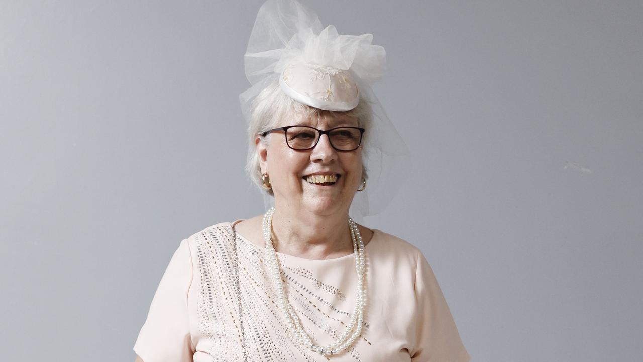 Lorraine Asprey models a wedding day outfit on sale for $45 from the St Vincent de Paul Society’s opportunity shop at the Showgrounds Shopping Centre, Mulgrave Road, Bungalow. Picture: Brendan Radke