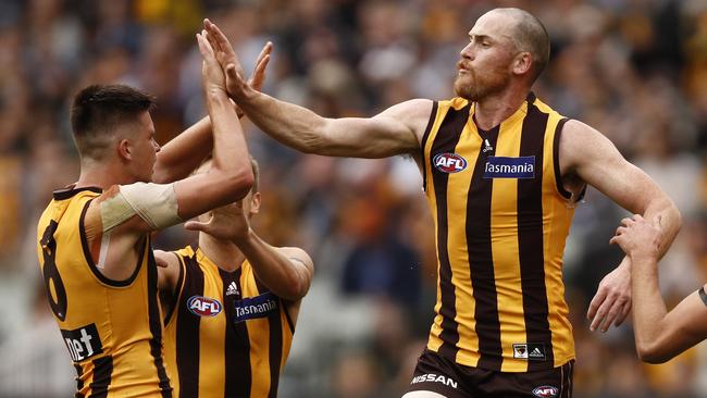 Jarryd Roughead celebrates a goal with Mitchell Lewis. Picture: AAP