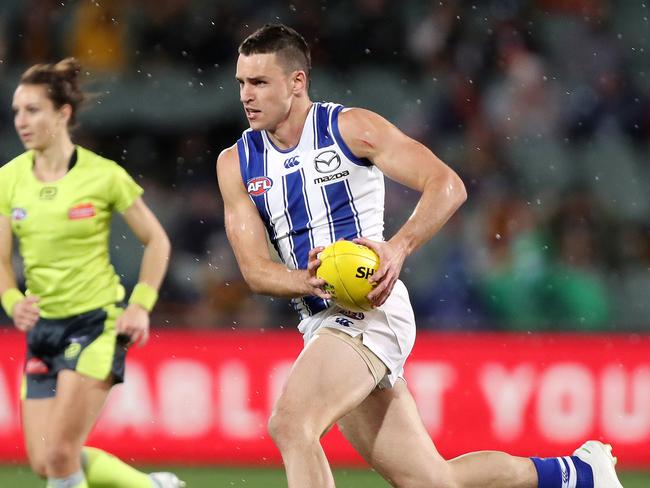 ADELAIDE, AUSTRALIA - AUGUST 22: Luke Davies-Uniacke of the Kangaroos during the 2021 AFL Round 23 match between the Adelaide Crows and the North Melbourne Kangaroos at Adelaide Oval on August 22, 2021 in Adelaide, Australia. (Photo by Sarah Reed/AFL Photos via Getty Images)