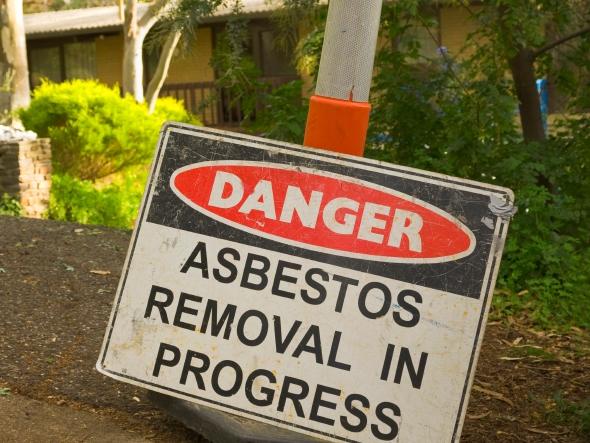 Generic asbestos removal sign outside a home containing the material. Picture: Asbestos Awareness