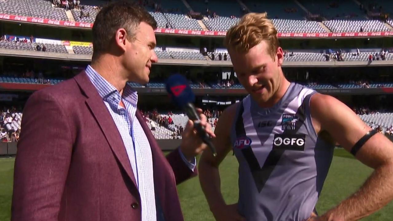 Jack Watts held an emotional interview with Cameron Mooney after Port Adelaide defeated Melbourne.