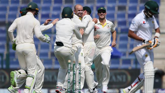 Australian spinner Nathan Lyon celebrates after dismissing Babar Azam