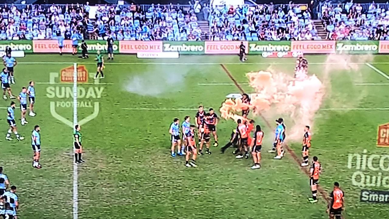 For the second straight game, a pitch invader made it onto the field in an NRL match. Picture: Fox League