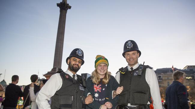 Metropolitan Police PC Aulakh and PC Emerton with Monica Canning, from Canberra. Picture: Ella Pellegrini