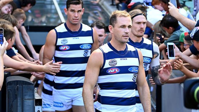 Joel Selwood leads his team out onto the MCG for Round 1 of the 2022 season.