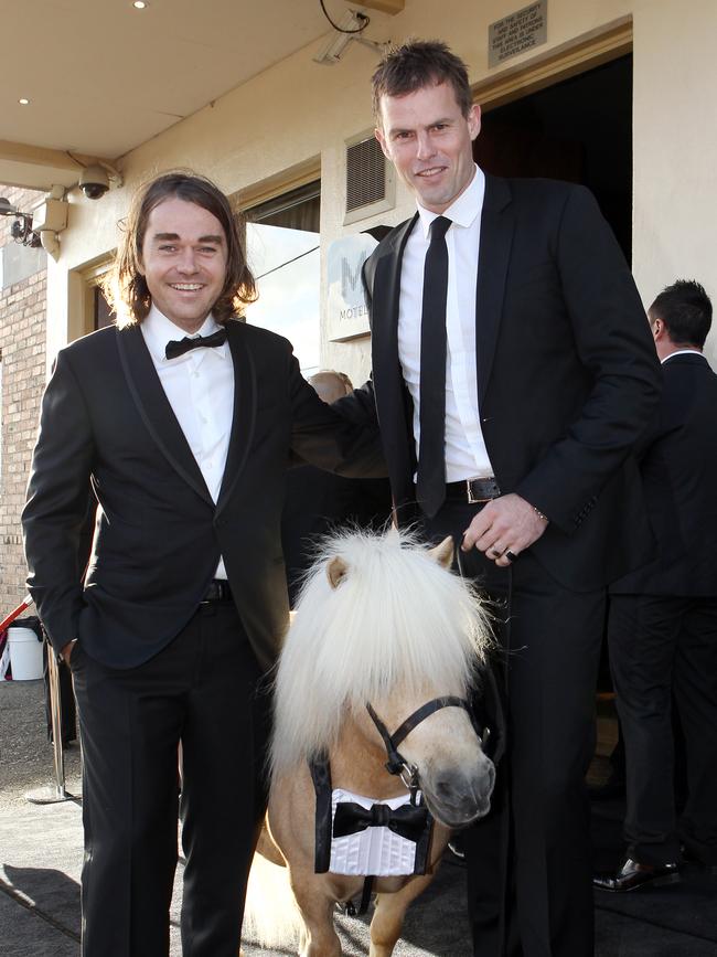 Shannon Bennett and Luke Darcy with a pony.